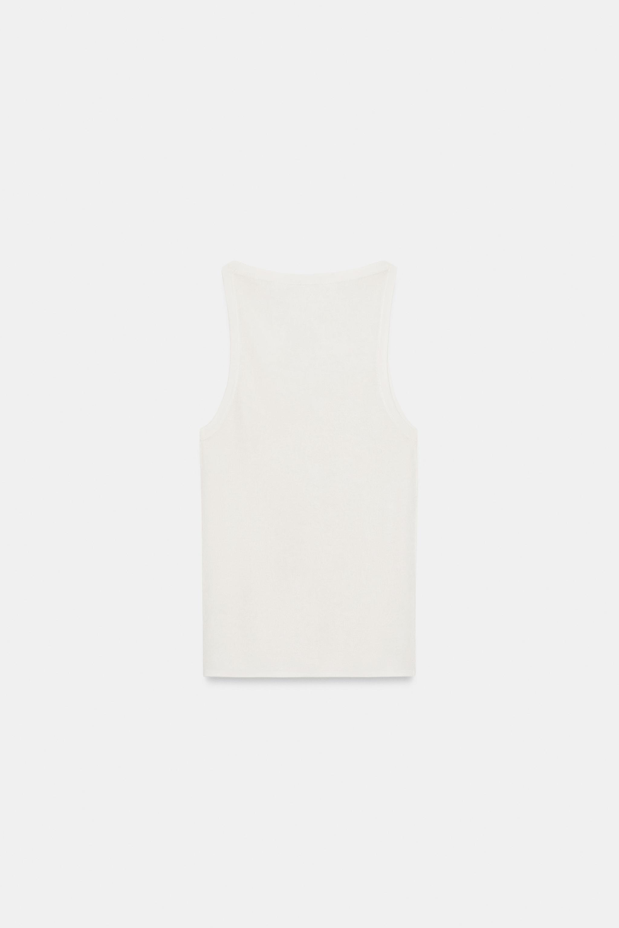 TOP EN MAILLE FINE SANS MANCHES